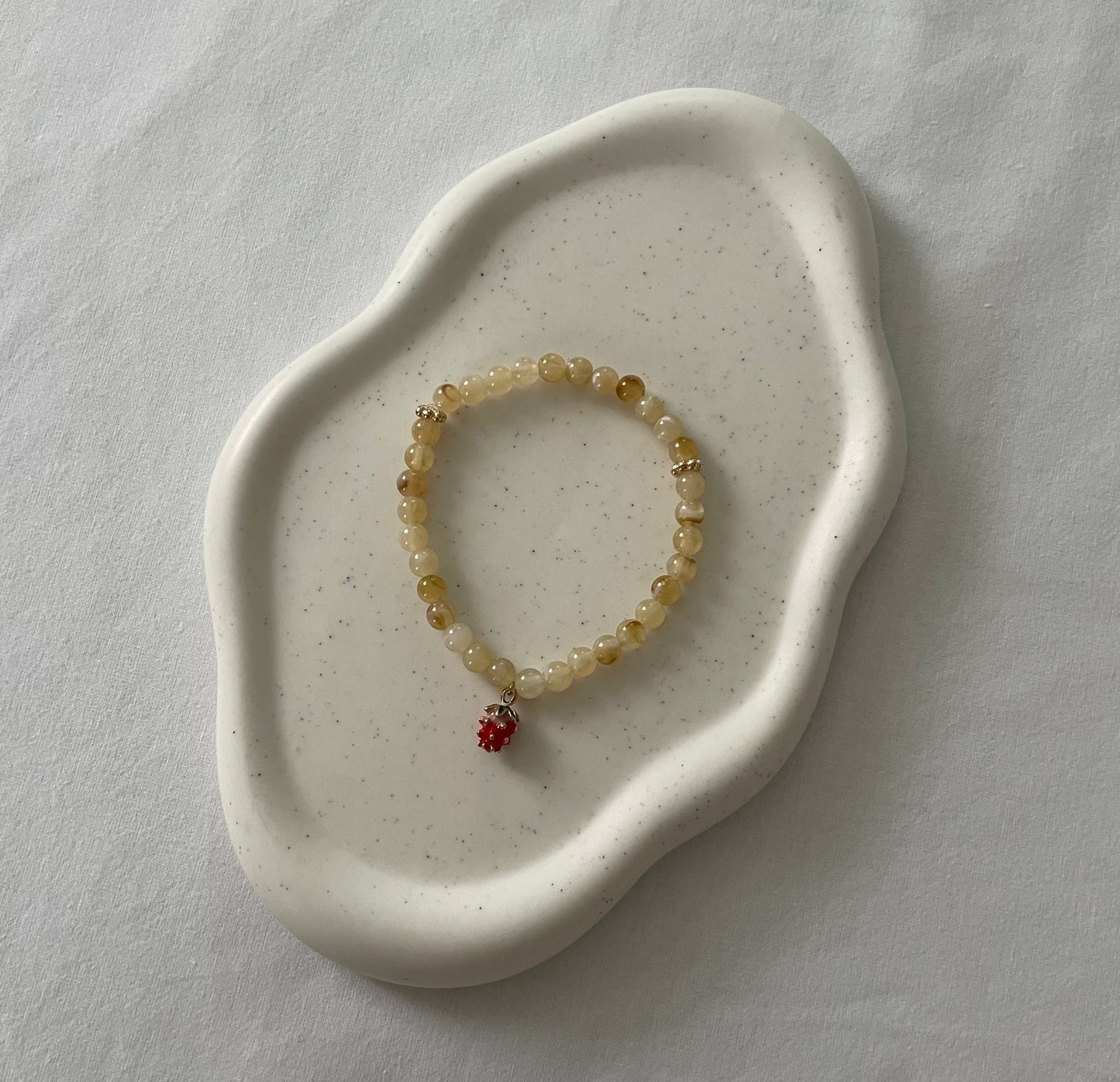 Tasbih bracelet en acrylique - amande